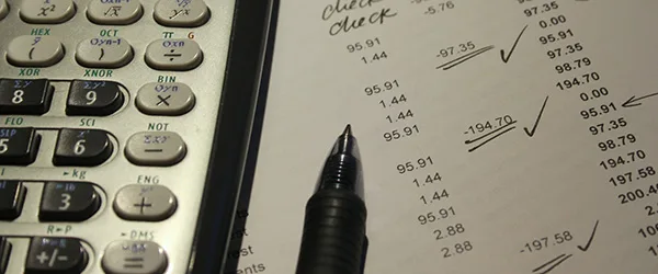 Administrative support — reviewing documents at a desk