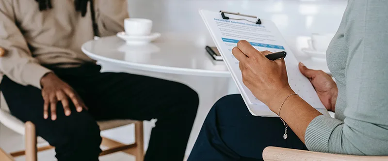 Human resources support — team interview at an office table
